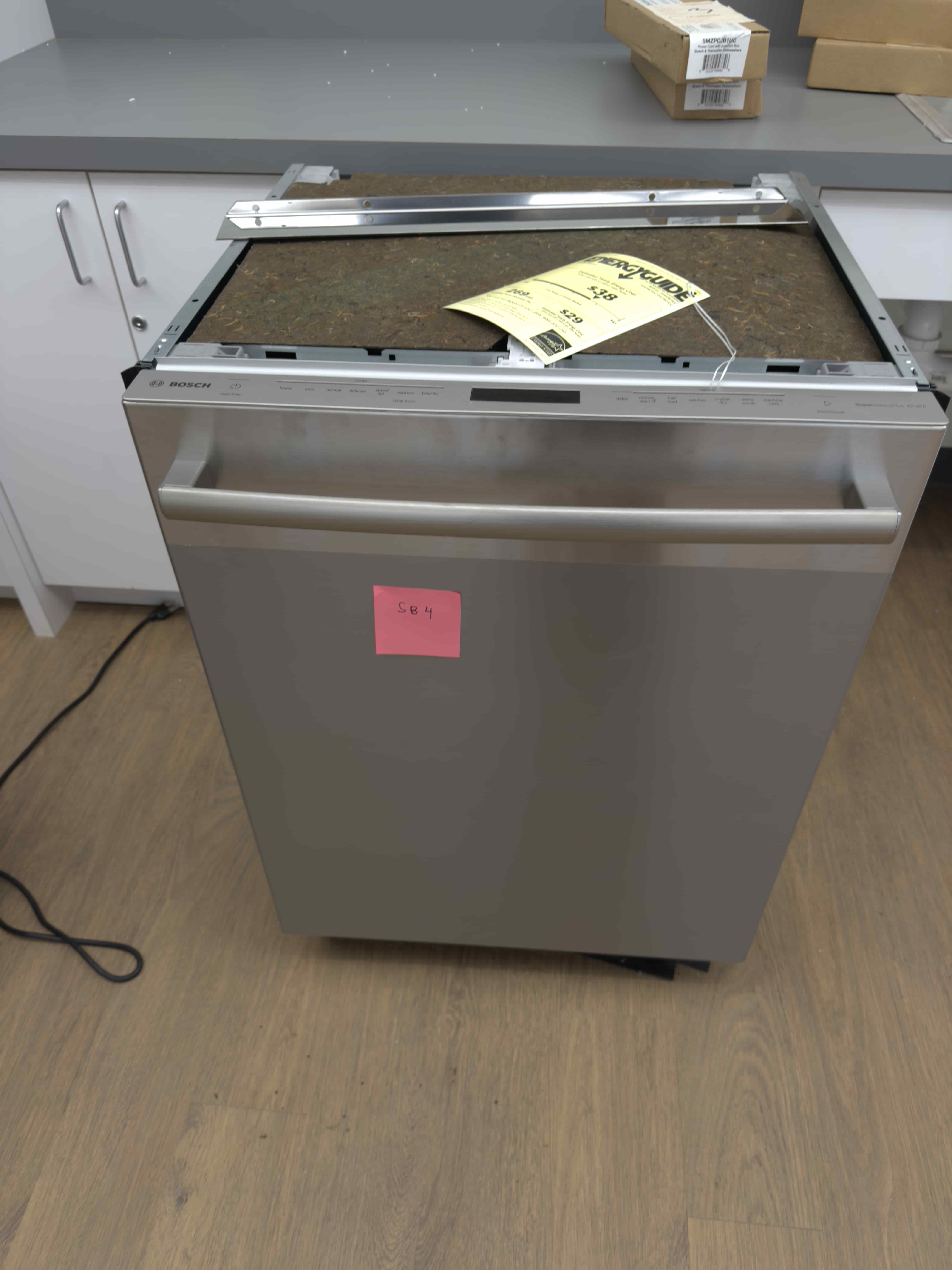 SB04: Bosch stainless dishwasher with concealed controls; includes top mounting rail as pictured., photo 2