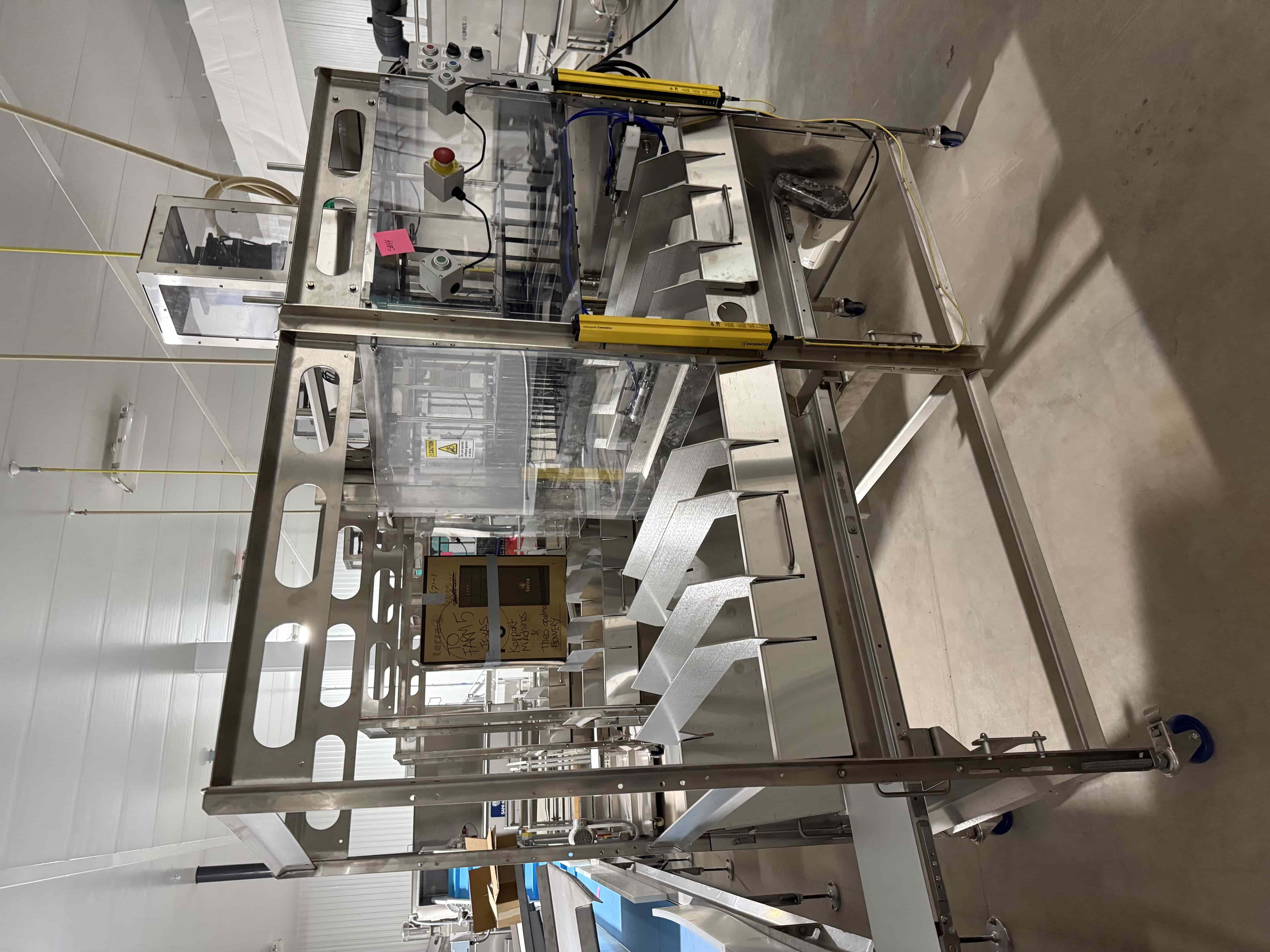 SB44: Koppert Machines Plug Puncher / Substrate Ejector with Integrated Conveyor, SCE Control Panel, Contrinex IO-Link Sensor, and Safety Light Curtain – Retail price $32,475.  Located in Tray Washing Room, photo 4