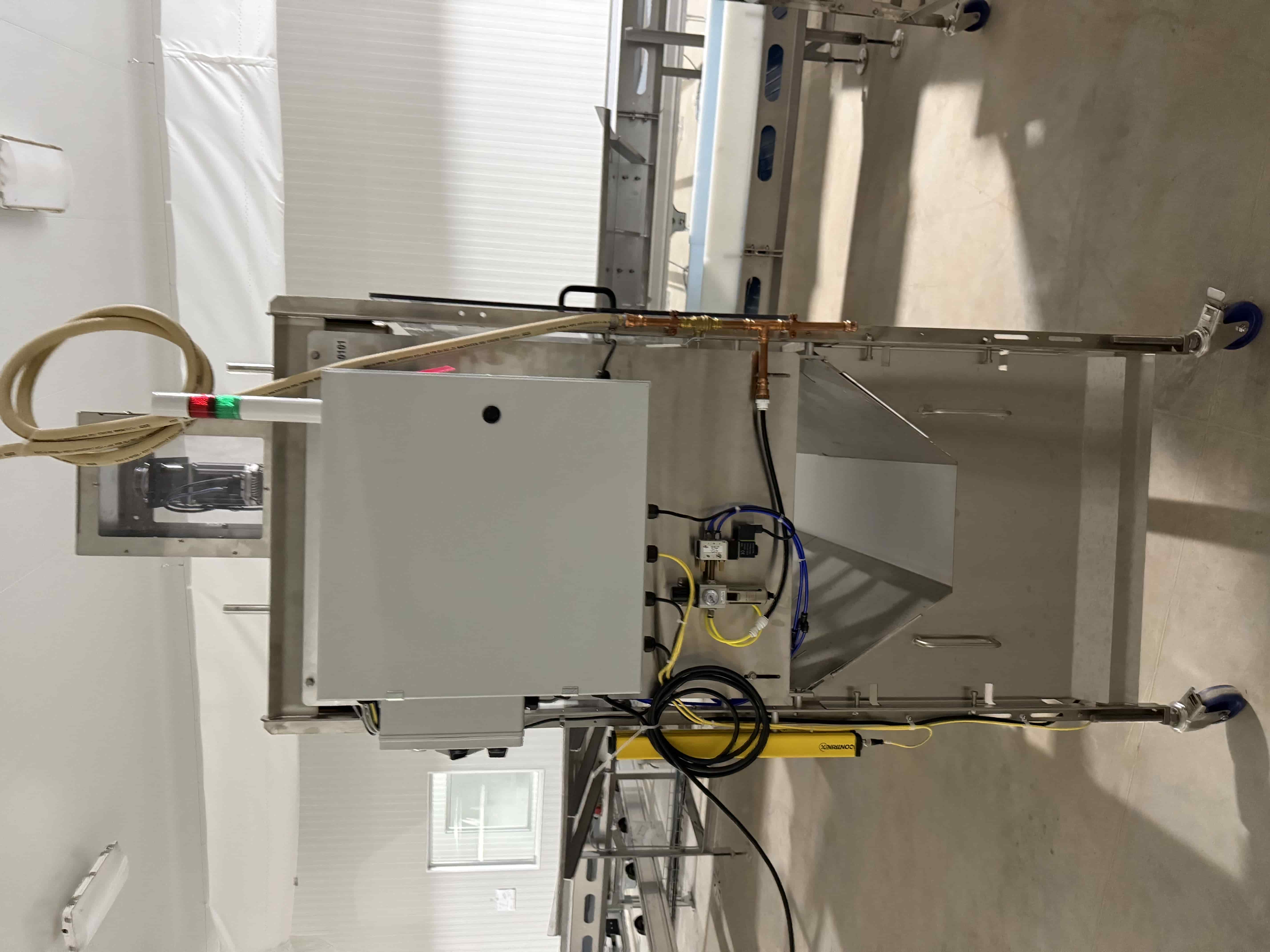 SB44: Koppert Machines Plug Puncher / Substrate Ejector with Integrated Conveyor, SCE Control Panel, Contrinex IO-Link Sensor, and Safety Light Curtain – Retail price $32,475.  Located in Tray Washing Room, photo 2