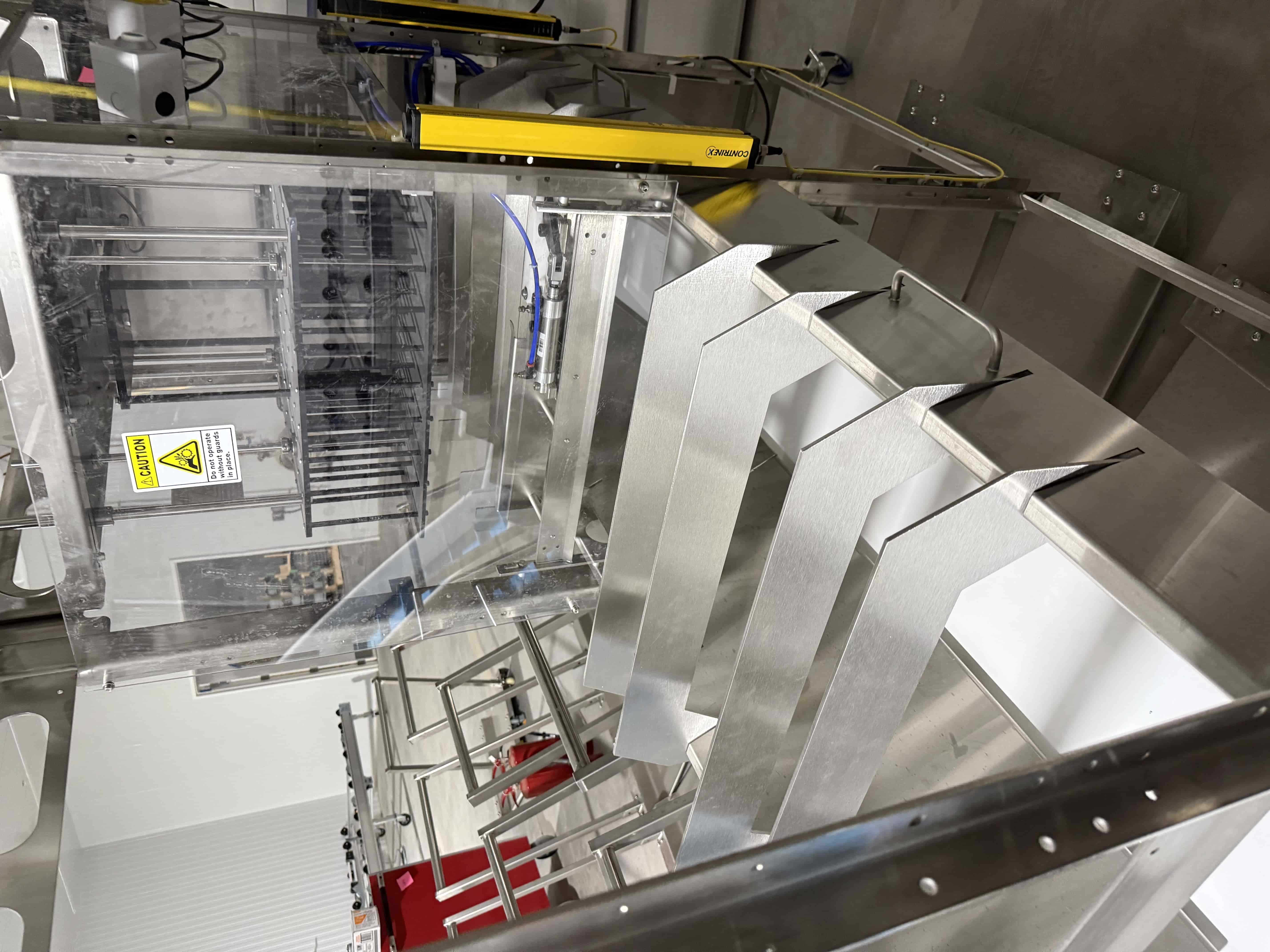 SB46: Koppert Machines Plug Puncher / Substrate Ejector with Integrated Conveyor, SCE Control Panel, Contrinex IO-Link Sensor, and Safety Light Curtain – Retail price $32,475. Located in Tray Washing Room, photo 2
