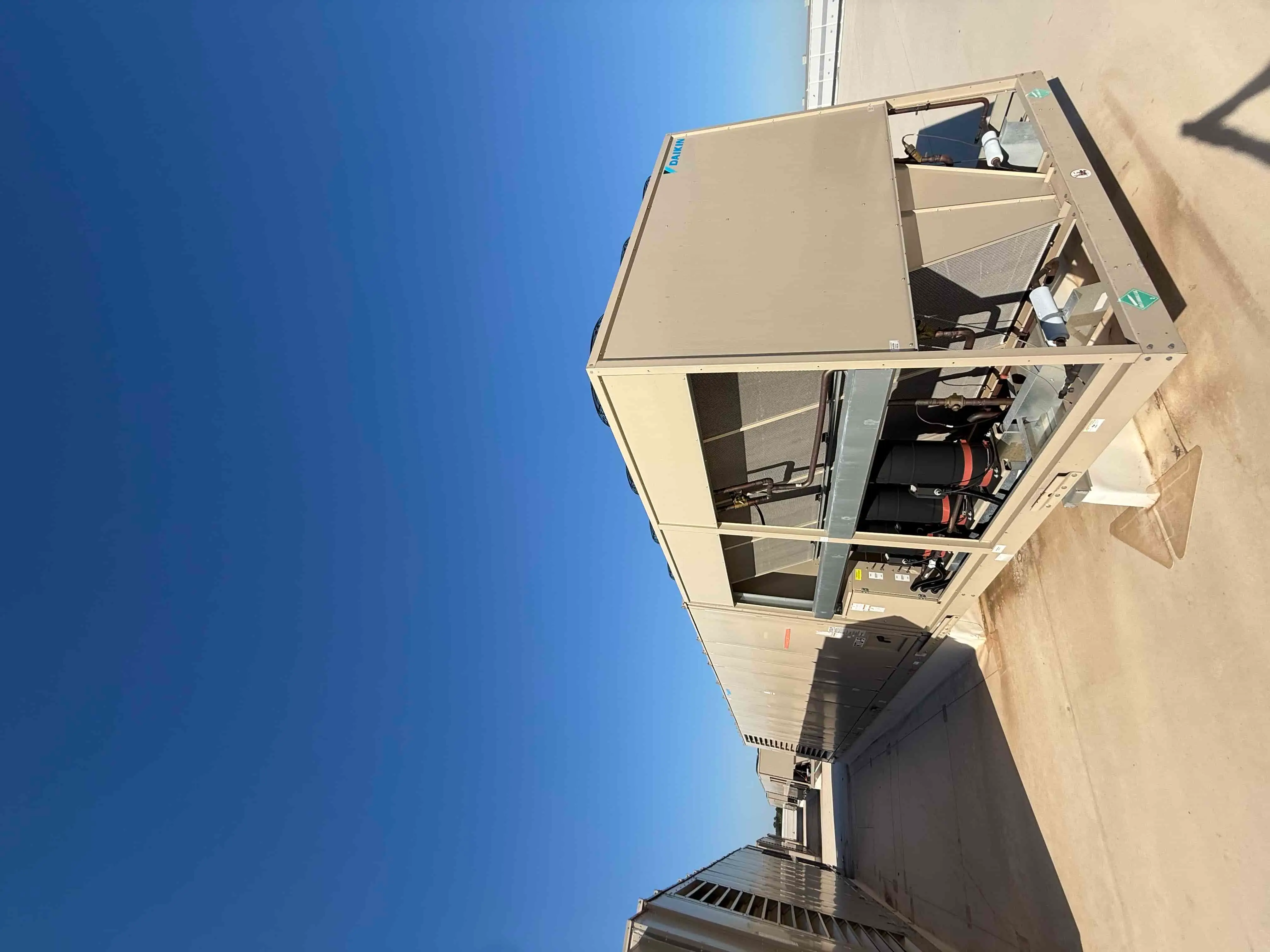 SB6006a: RTU-9 – Daikin RPS 130D Rooftop Packaged HVAC Unit, 130 Ton Nominal, ~38,000 CFM Supply Airflow, Air-Cooled DX Package