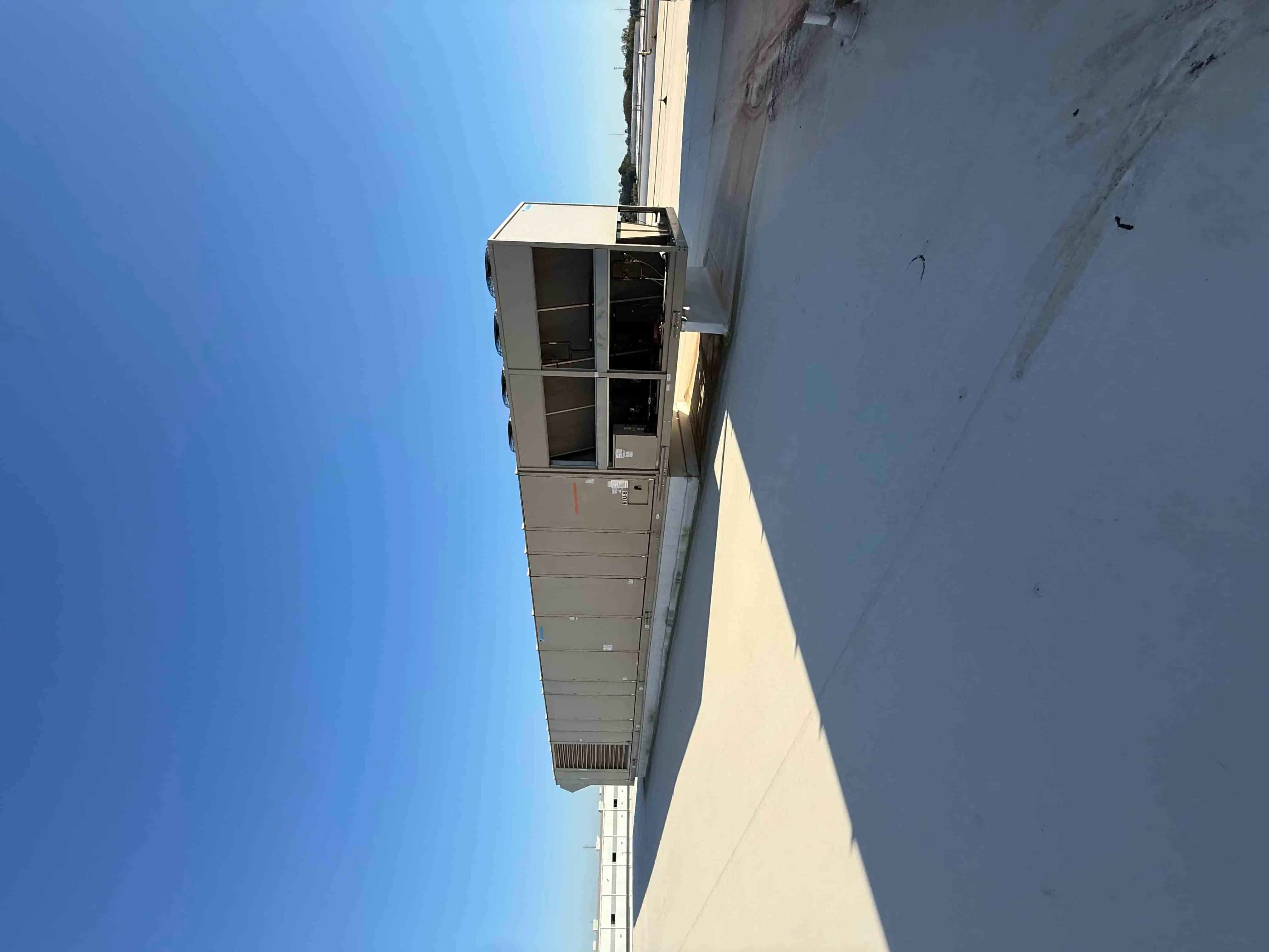 SB6004: RTU-6 – Daikin RPS 130D Rooftop Packaged HVAC Unit, 130 Ton Nominal, ~38,000 CFM Supply Airflow, Air-Cooled DX Package