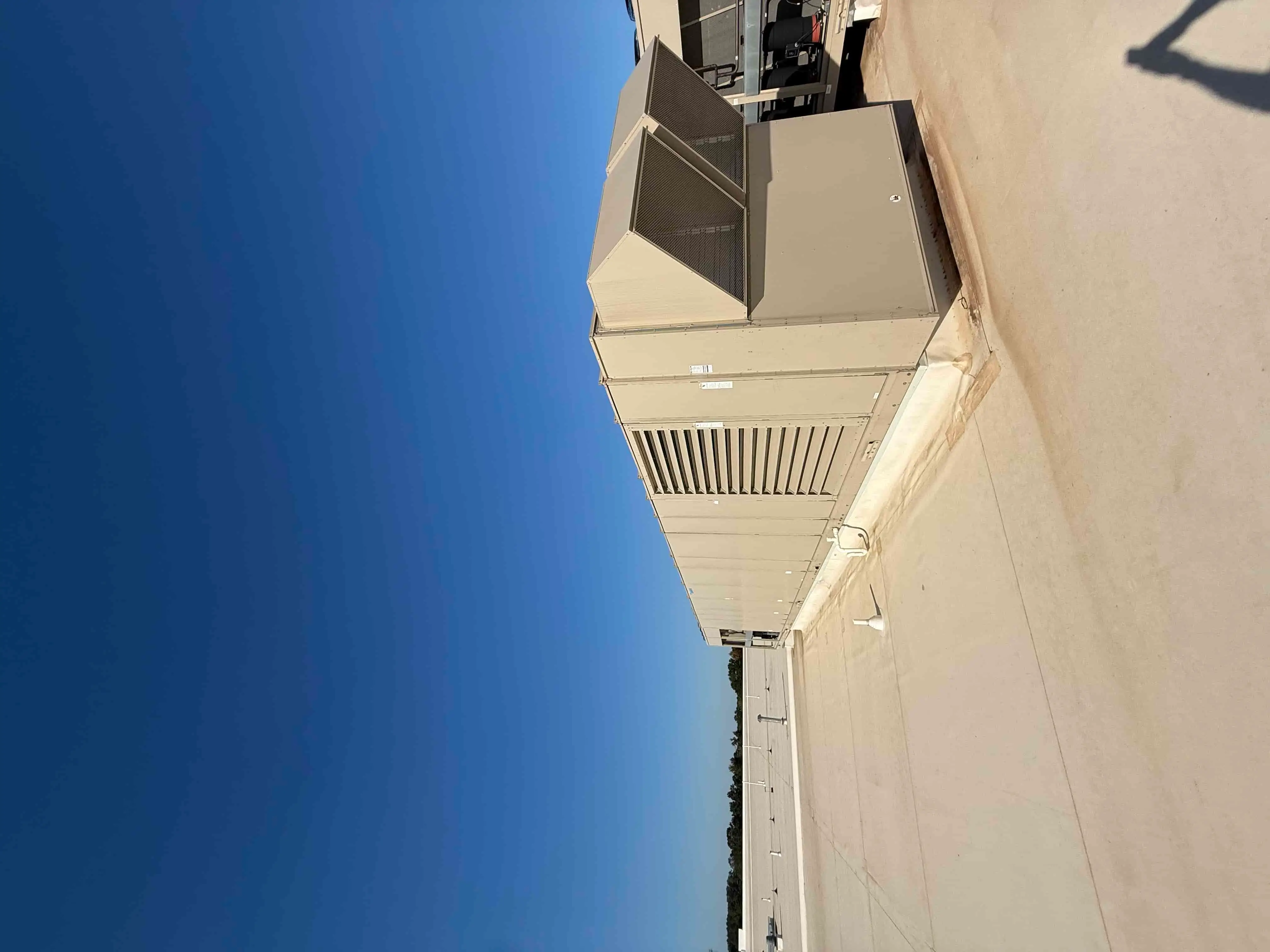 SB6008: RTU-11 – Daikin RPS 130D Rooftop Packaged HVAC Unit, 130 Ton Nominal, ~38,000 CFM Supply Airflow, Air-Cooled DX Package
