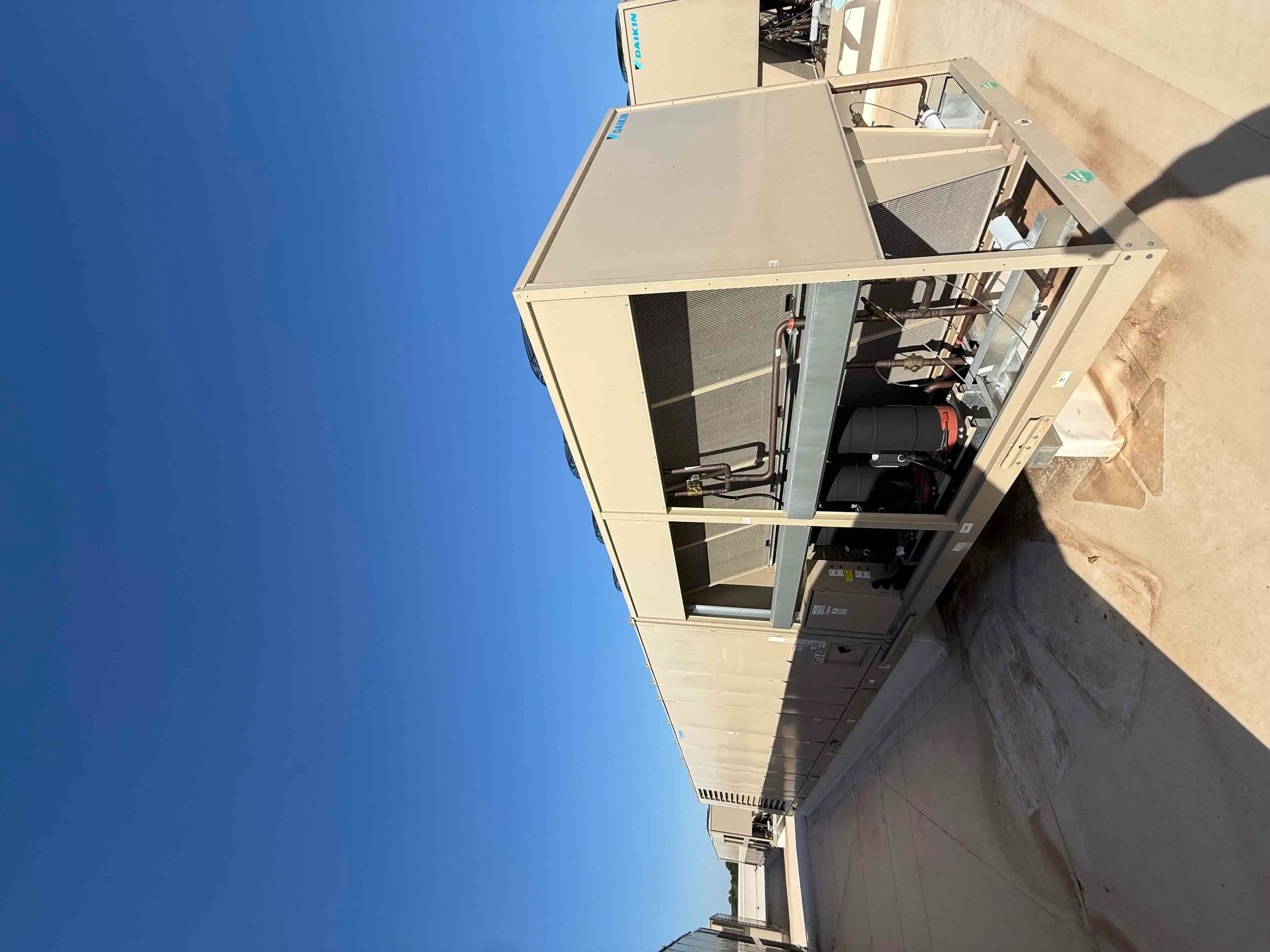 SB6006:  RTU-8 – Daikin RPS 130D Rooftop Packaged HVAC Unit, 130 Ton Nominal, ~38,000 CFM Supply Airflow, Air-Cooled DX Package